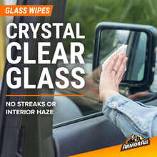 Glass wipe cloth being used to clean a car window