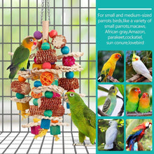 Hanging bird chew toy with corn cob pieces, rope, rattan ball, and colorful wooden cubes