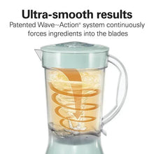 Hamilton Beach mint smoothie blender with clear jar and transparent lid, jar contents visible