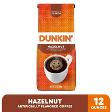 Dunkin' Hazelnut ground coffee bag with 12 ounces panel and white cup graphic