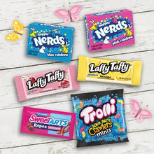 Assorted candy packages: Nerds, Laffy Taffy, Sweetarts Ropes, Trolli mini