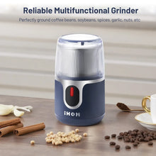 Blue cordless electric coffee grinder with red power light and clear grinding top
