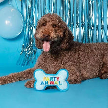 Bone-shaped plush dog toy labeled Party Animal in blue