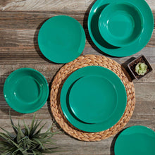 Dark green melamine plates and bowls set, including a large serving bowl.