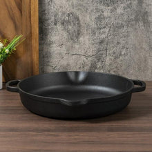 Black cast iron frying pan with raised rim and two side loop handles