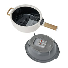 Electric skillet interior base with heating plate and detached lid cover