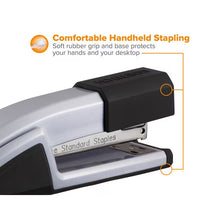 Black top and silver base handheld stapler with comfort grip area