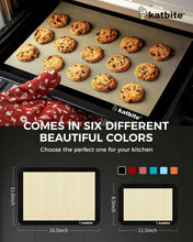 Silicone baking mat on baking sheet with cookies, black border