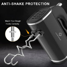 Black electric hand mixer with metal dough hooks