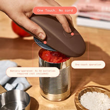 Chocolate-brown automatic can opener held over a can, showing one-touch operation