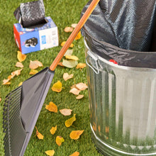 Large clear drawstring trash bags in an outdoor bin with a sealed top