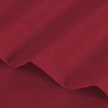 Microfiber sheet fabric in deep red with stitched seam detail and smooth texture