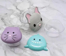 Three animal snack containers with clear lids: gray mouse, purple cat, teal shark.
