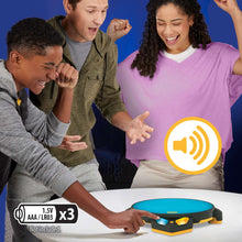 Electronic action game on a table while players gesture and laugh