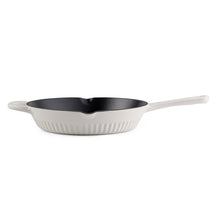 10-inch enameled cast iron skillet, black interior, white exterior and long handle
