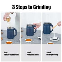 Blue electric powder grinding machine with lid and handle, shown producing fine powder