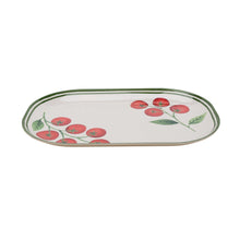 Oval tomato serving tray with red tomato and green leaf print border