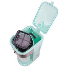 Teal iced coffee and tea maker with open lid and removable filter basket