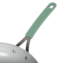 Green frying pan handle with stainless steel rivets