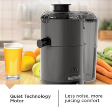 Fruit and vegetable juicer with clear housing, black base, and side control knob