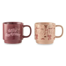 Stacking stoneware mugs: maroon “Hello gorgeous” mug and blush bow-pattern mug