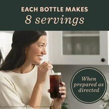 Cold brew concentrate bottle with dark coffee drink; text notes 8 servings per bottle