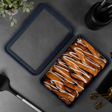 Atlantic blue silicone baking dish with lid, filled with iced pastry slices