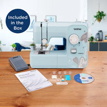 Brother portable mechanical sewing machine in light aqua blue with presser foot and included accessories