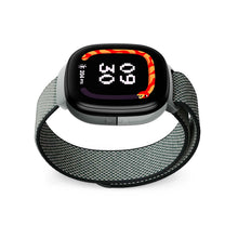 Kids LTE smartwatch with gray mesh strap, screen showing 09 30 and activity icon