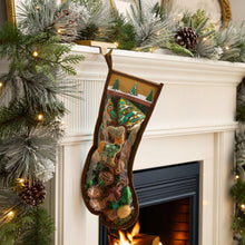 Hanging felt cat toy stocking with printed cat, tree, and toy shapes in green and brown