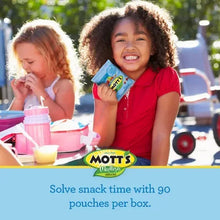 Mott's fruit flavored snack pouches in hand, children smiling outdoors