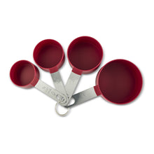 Red measuring cups and spoons set with nested bowls and metal ring