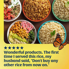 Assorted cooked rice bowls with vegetables and butterfly garnish