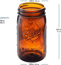 Amber wide-mouth glass mason jar with Ball logo, 32 oz capacity, no lid or band