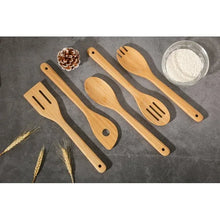 Bamboo cooking utensil set of five, laid out with mixed spoon and spatula heads