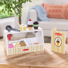 Wooden ice cream counter playset with scoop, cups, and pretend ice cream toppings on stand
