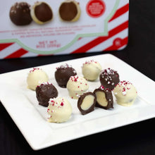 Peppermint chocolate truffles with dark and white centers on a plate