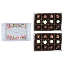 Cheesecake truffles gift box with two open chocolate truffle trays
