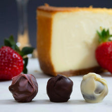 Cheesecake truffle assortment with dark, pale, and white chocolate pieces