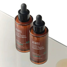 ACWELL pH balancing licorice serum bottles with black droppers, amber glass, angled view.