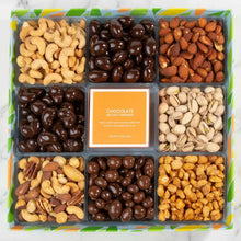 Assorted nut and chocolate tray with nine compartments in a green striped box