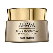 AHAVA Crystal Osmoter X6 smoothing cream jar with gold lid and gray container