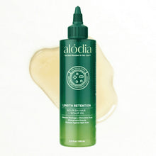 ALODIA green hair and scalp oil bottle with avocado oil treatment
