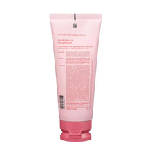 AMOS True Repair hair treatment tube, back label view on pink squeeze bottle