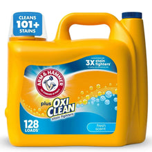 Yellow liquid laundry detergent jug with blue cap and front label for stain fighting