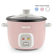 Pink rice & grain cooker with black lid and front cook/warm control panel, 4-cup size