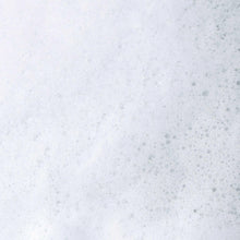 ATOPALM wash lather bubbles on light surface