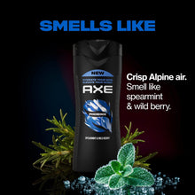 Body wash bottle with AXE Phoenix label, blue leaf graphic with green plant accents