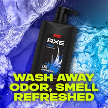 AXE Phoenix body wash bottle with pump in water splash, 'WASH AWAY ODOR' text