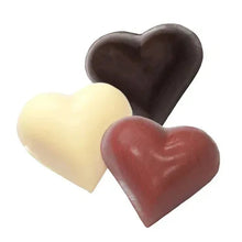 Assorted heart-shaped truffles: dark, milk, white, and red-brown